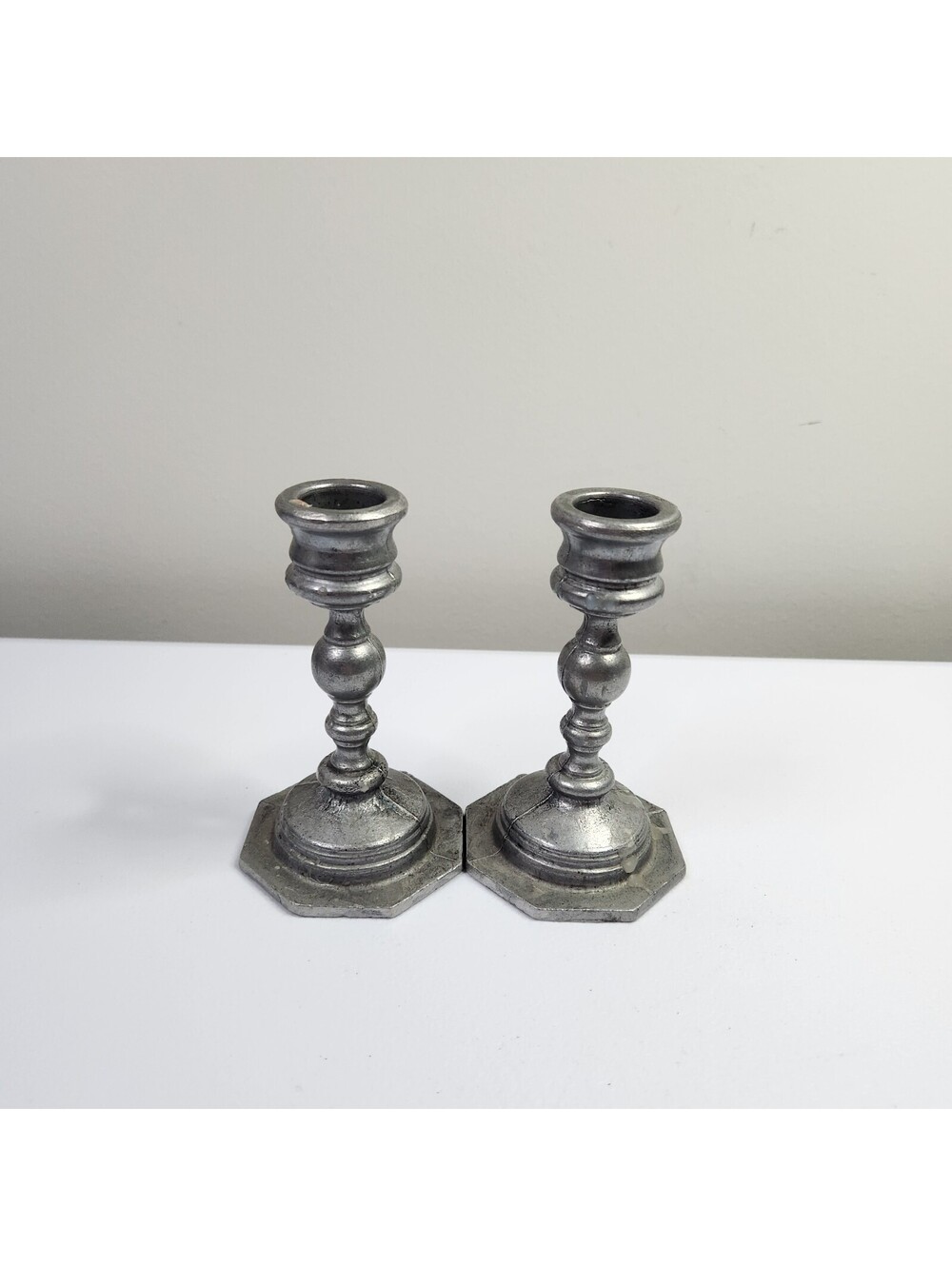 Pair of metal candlesticks holders